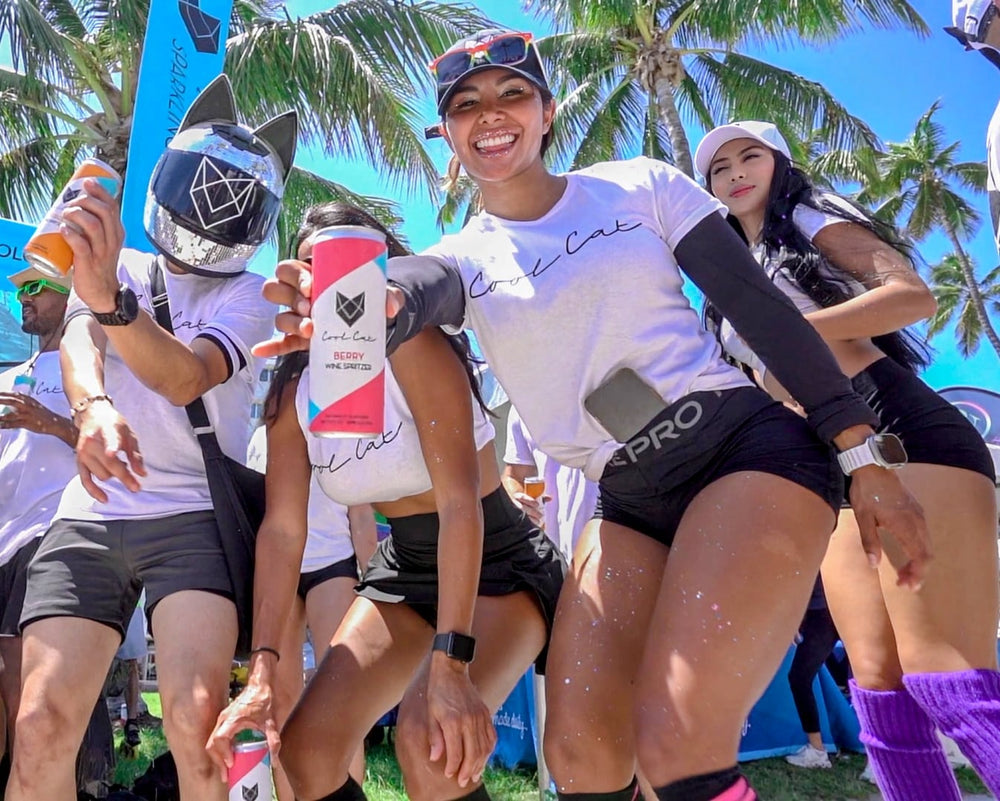 The Cool Cat team at Miami Beach Pride with sparkling cocktails.