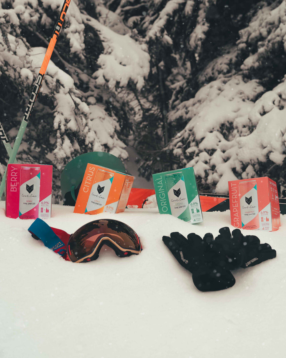 Packs of Cool Cat cocktails in the snow on a ski resort.