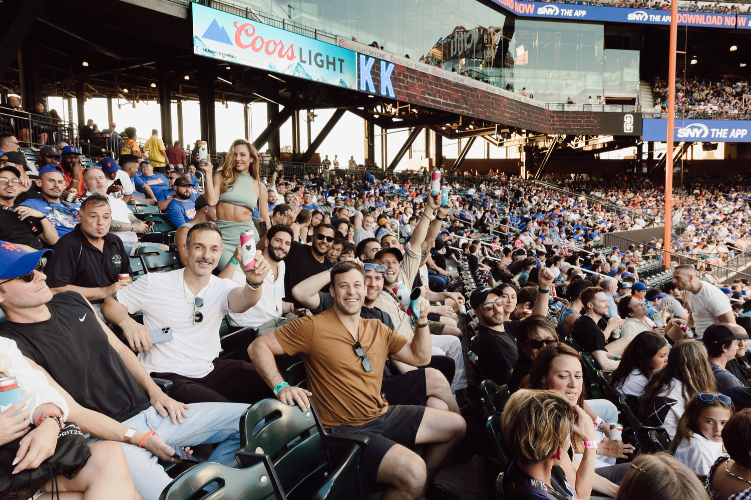 The Cool Cat Team enjoys canned wine spritzers at Citi Field in New York.